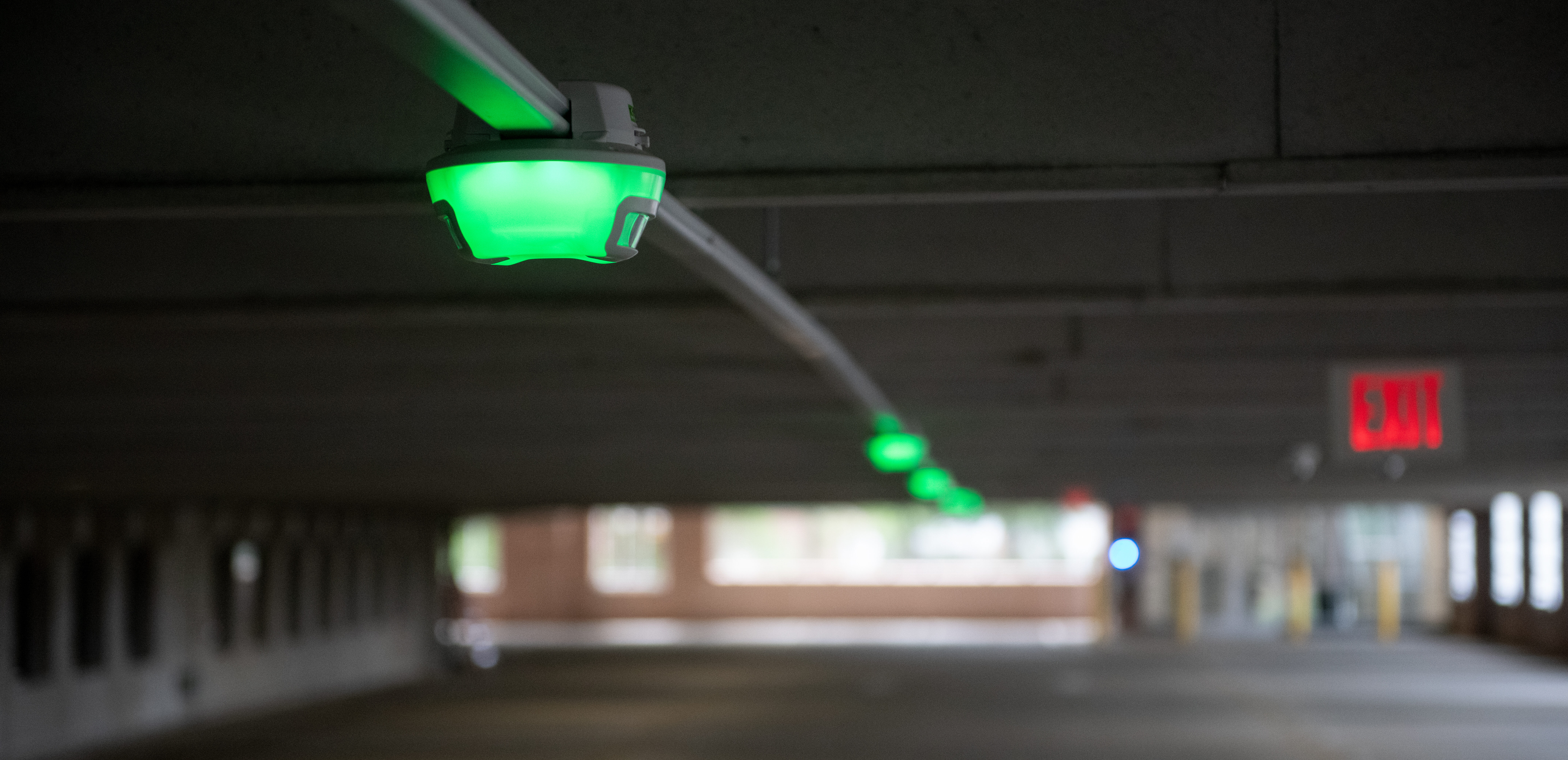 an automated parking guidance system recently installed in a parking garage just after it's been turned on and tested